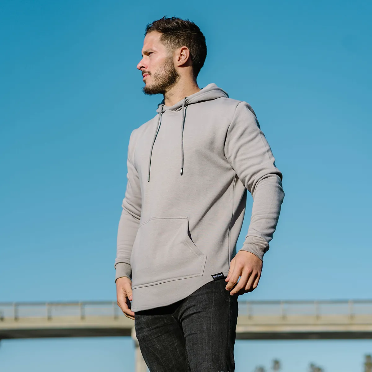 021 ESSENTIAL DROP CUT HOODIE - CEMENT