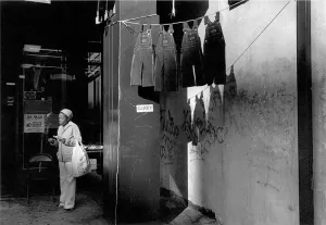 A Woman with Hanging Overalls