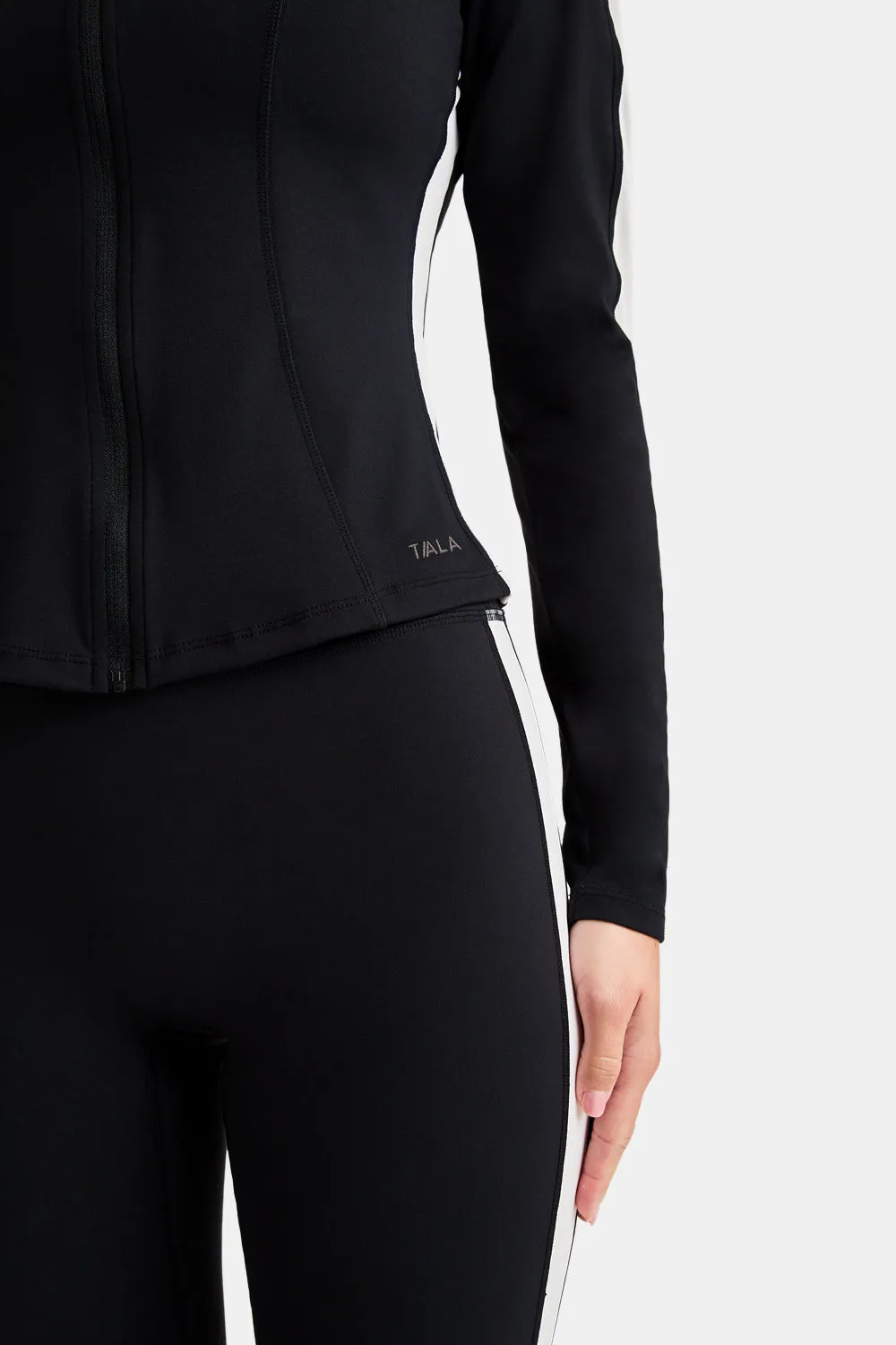 DAYFLEX CONTRAST STRIPE ZIP THROUGH JACKET - SHADOW BLACK AND IVORY