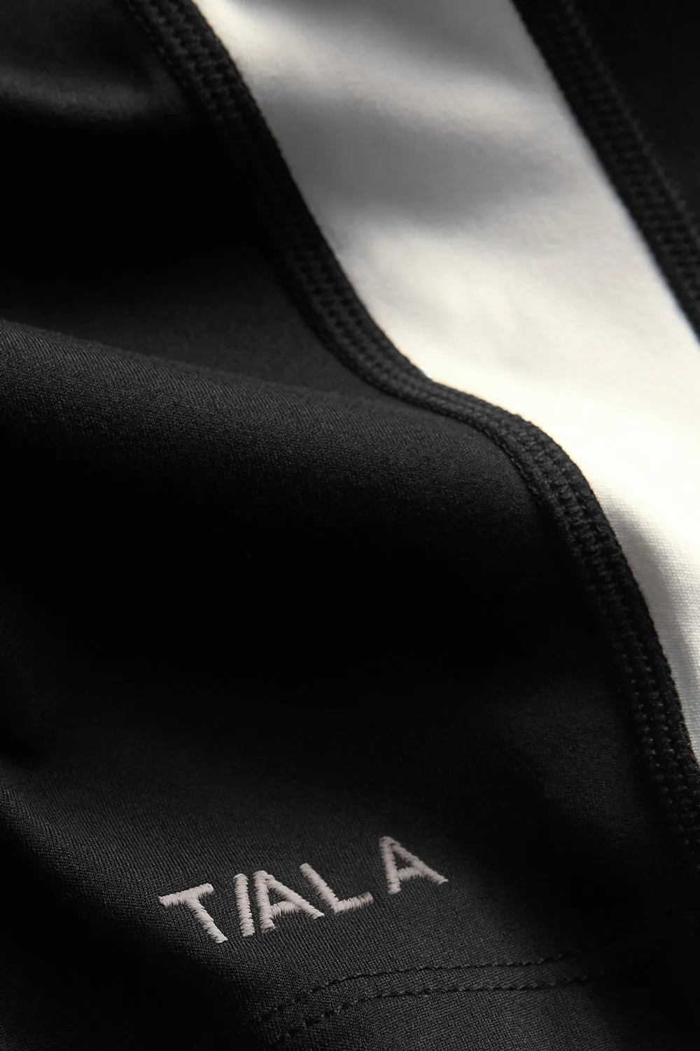 DAYFLEX CONTRAST STRIPE ZIP THROUGH JACKET - SHADOW BLACK AND IVORY