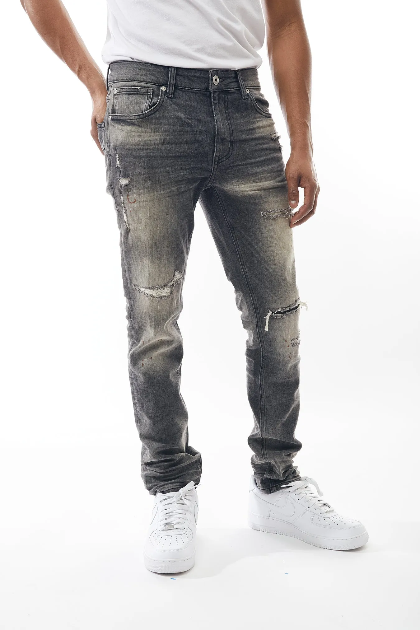 Ripped and Repaired Denim Jeans in Dove