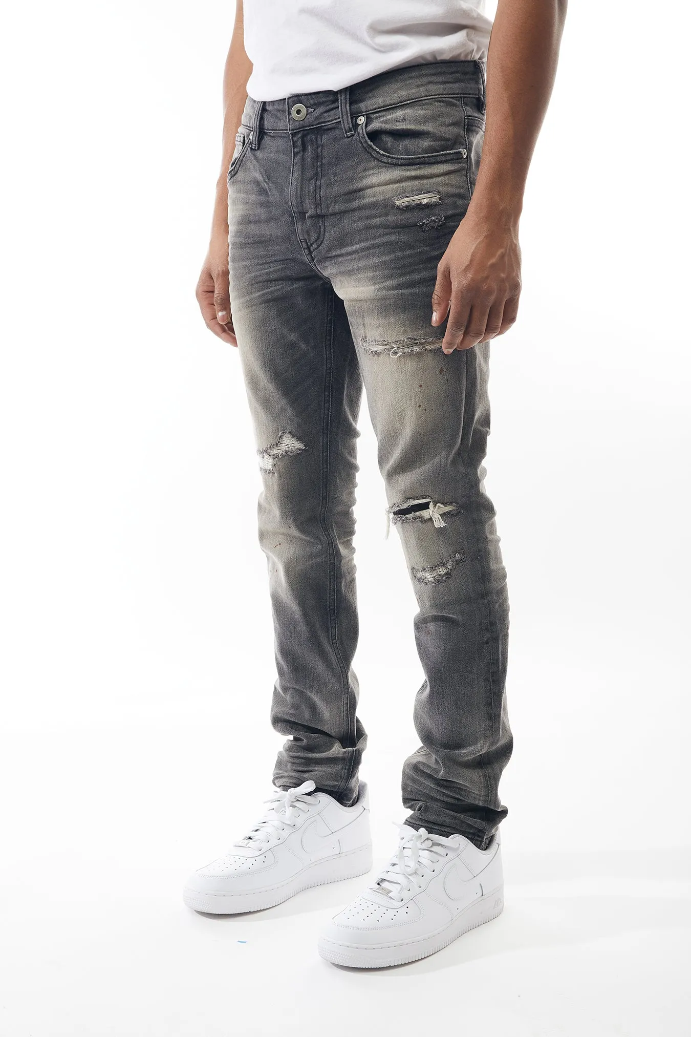 Ripped and Repaired Denim Jeans in Dove