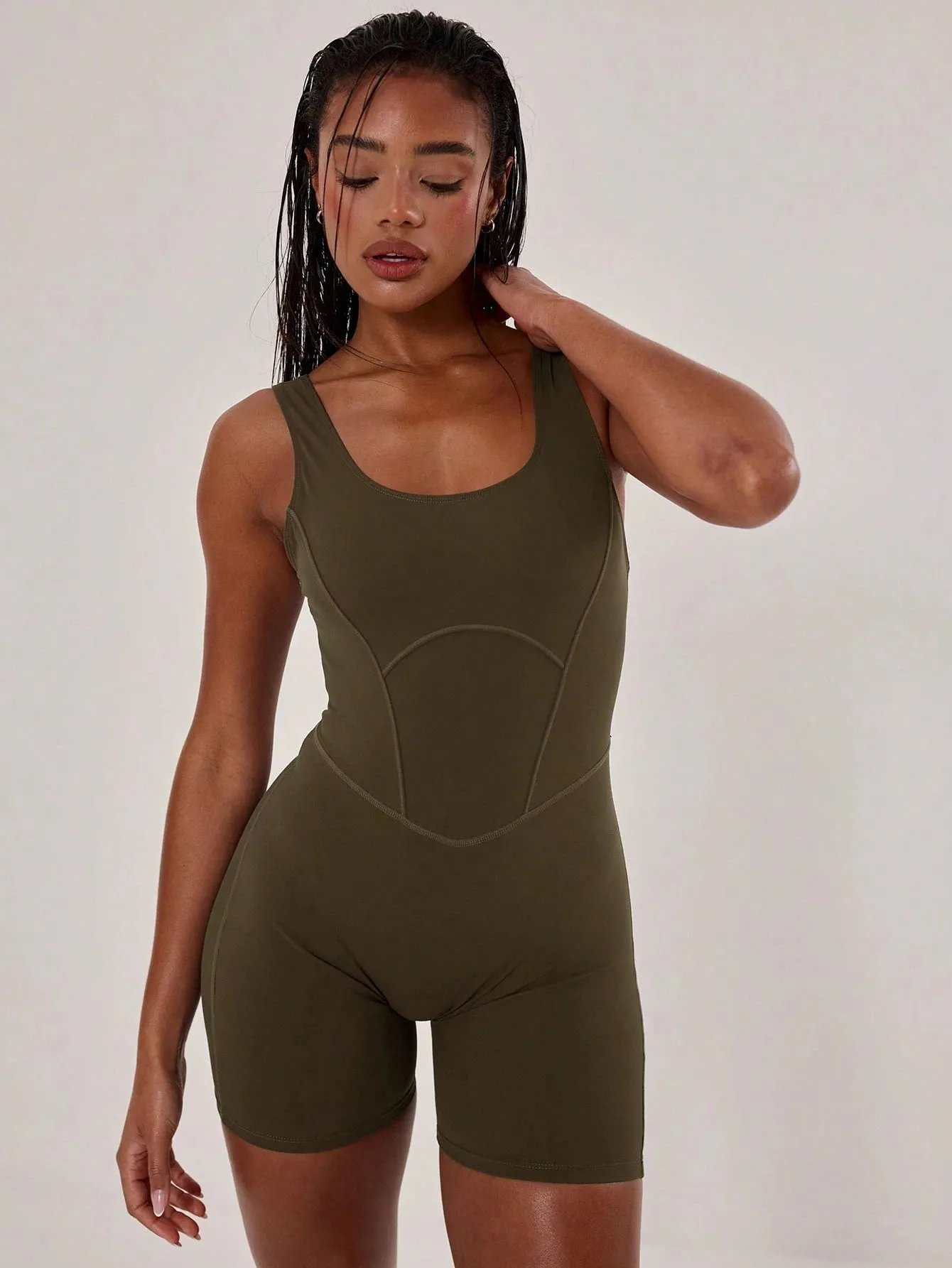 Sleek Stitched Racer Unitard – Sculpting & Stylish Jumpsuit