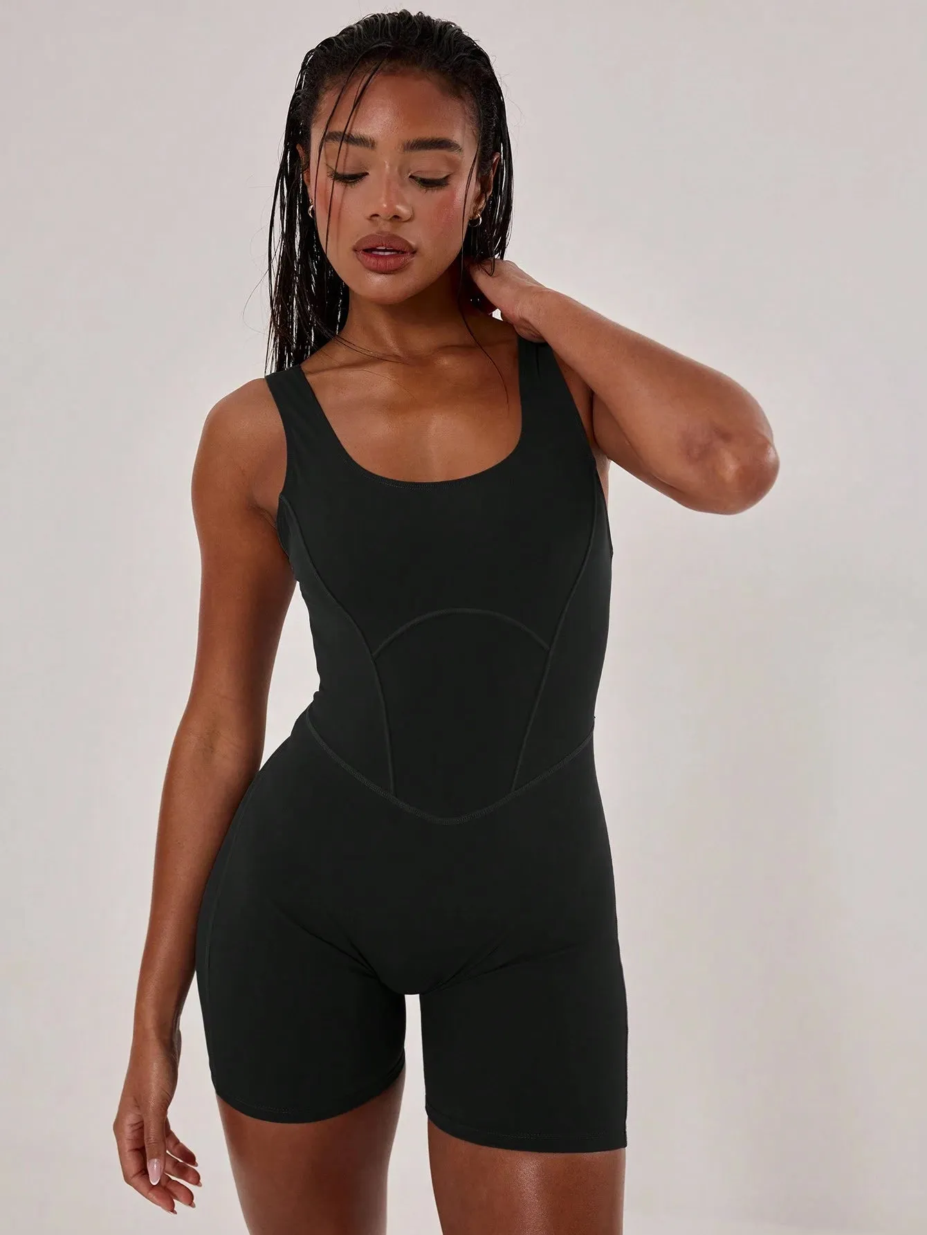 Sleek Stitched Racer Unitard – Sculpting & Stylish Jumpsuit
