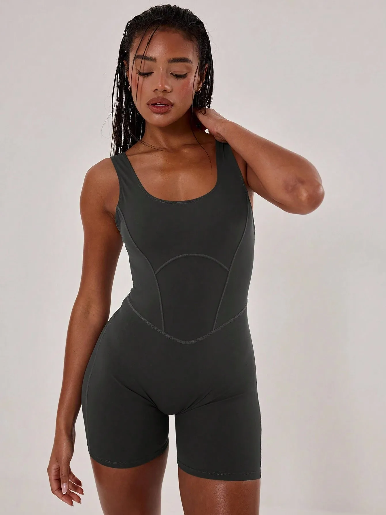 Sleek Stitched Racer Unitard – Sculpting & Stylish Jumpsuit