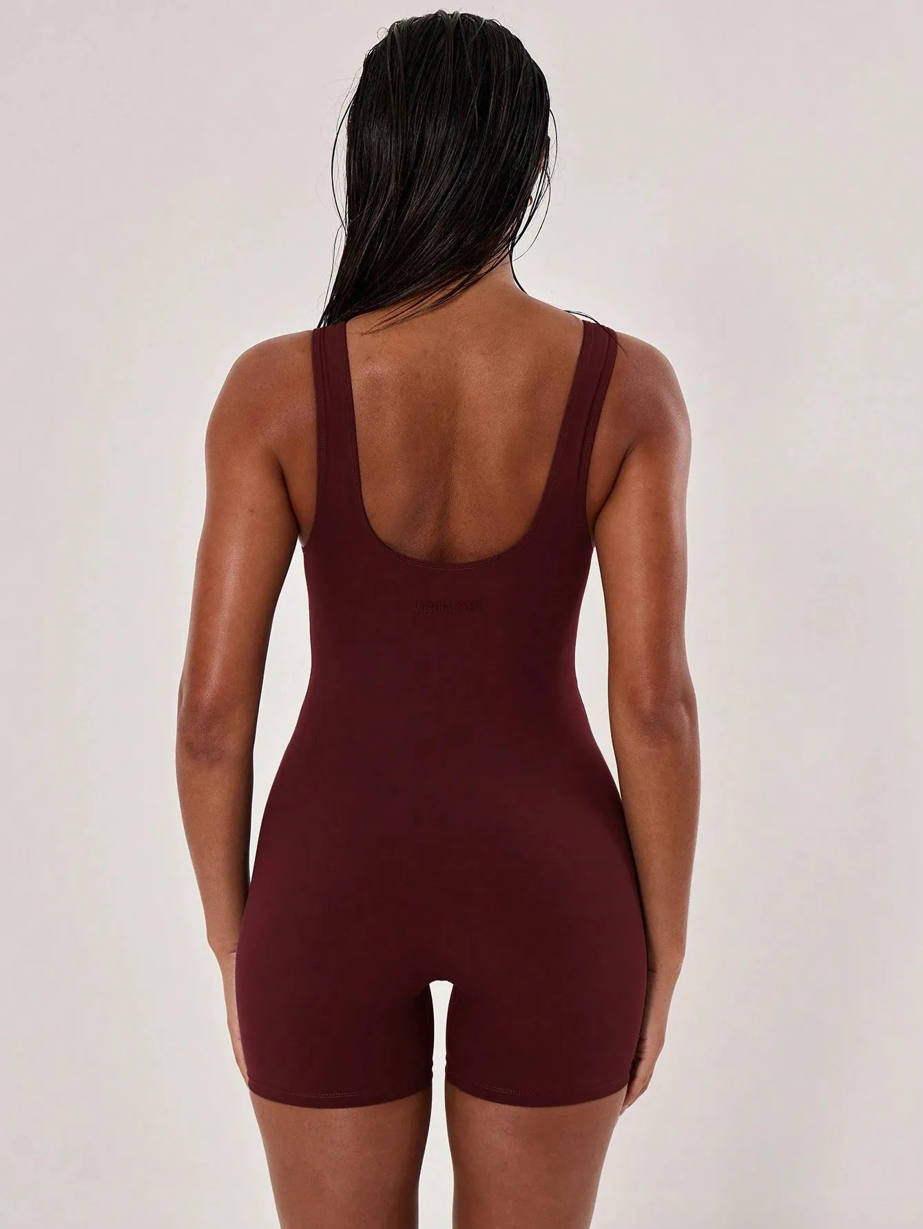 Sleek Stitched Racer Unitard – Sculpting & Stylish Jumpsuit