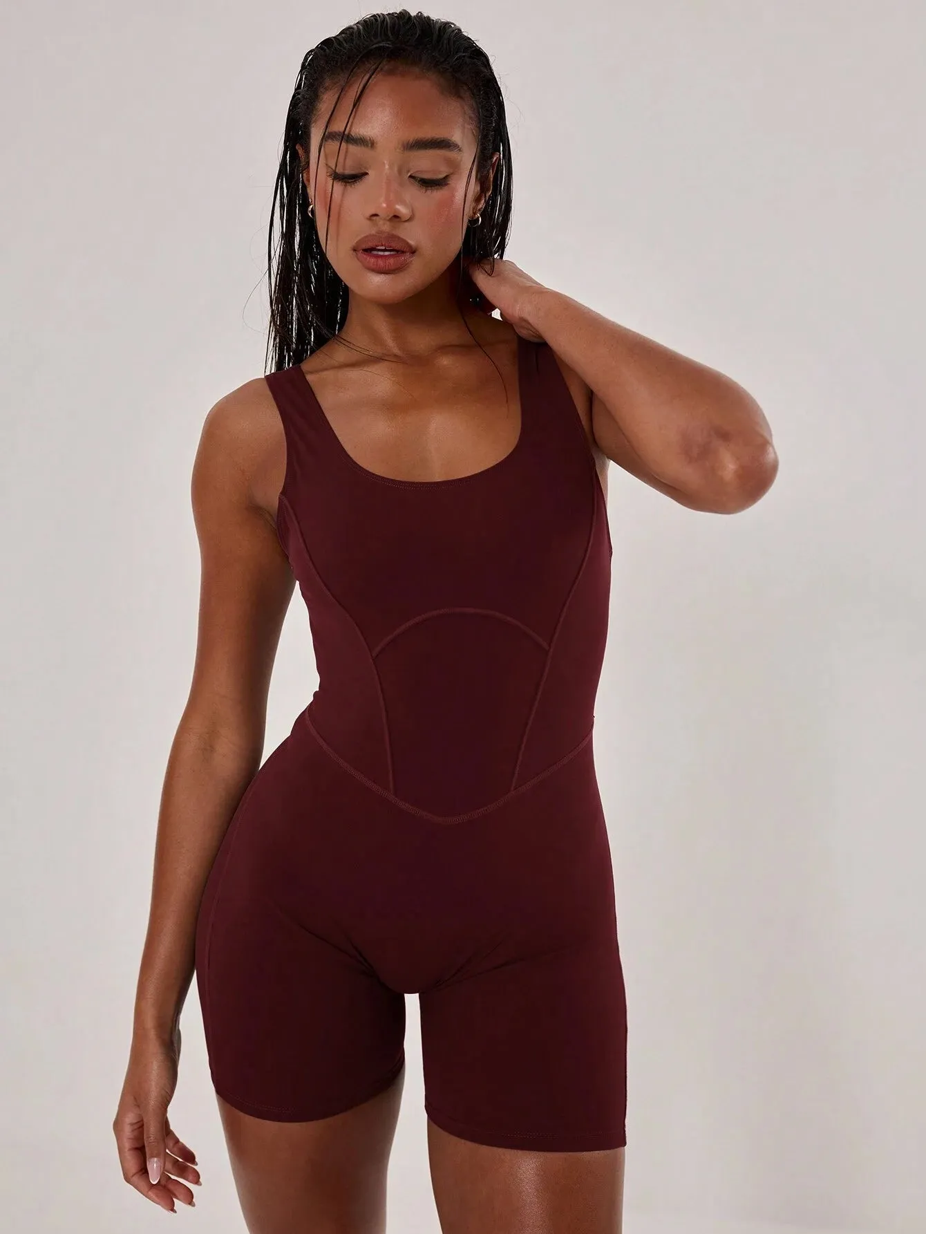 Sleek Stitched Racer Unitard – Sculpting & Stylish Jumpsuit