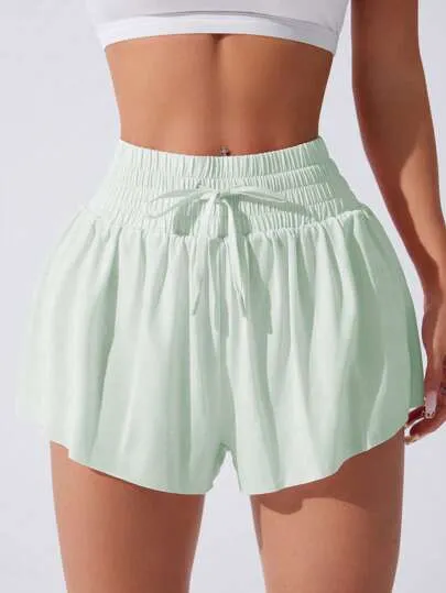 Sport Studio Knotted Pocket Yoga Shorts – Solid Color, Lightweight & Breathable