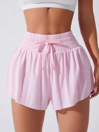 Sport Studio Knotted Pocket Yoga Shorts – Solid Color, Lightweight & Breathable