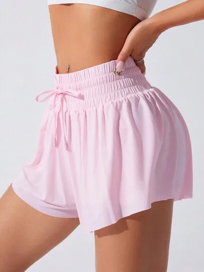 Sport Studio Knotted Pocket Yoga Shorts – Solid Color, Lightweight & Breathable